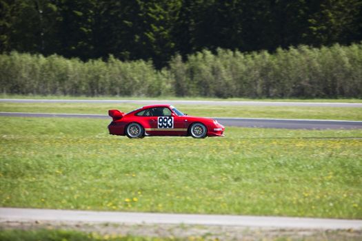 Red Racing car in movement