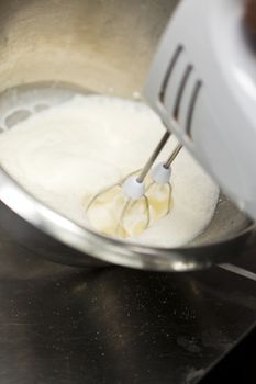 Mixing cream movement close up
