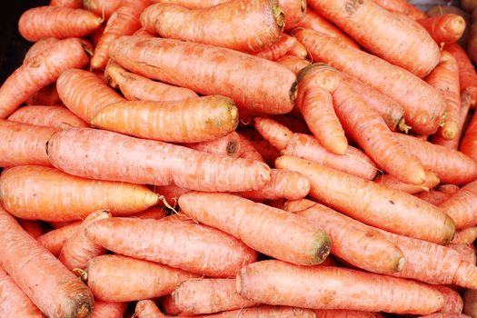 A background of the fresh young carrots.