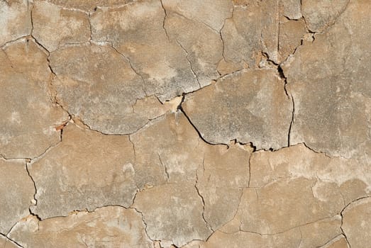 Texture of a cracked clay plastered wall