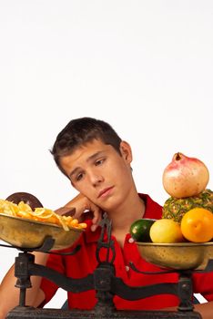 Teen  missing his junk food after a fruit diet