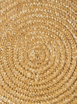 A spiraling wicker background showing detail, patterns, and texture