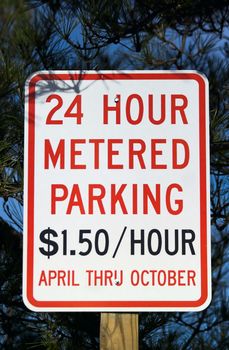 24 hour metered parking sign