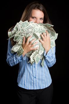 Young woman holding cash money