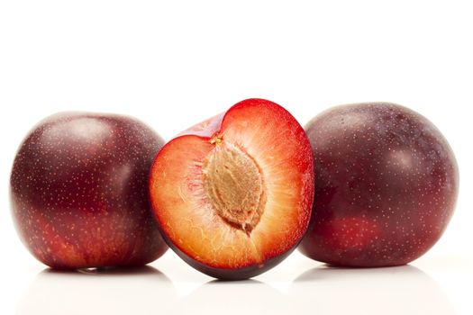 two and a half plum on white background