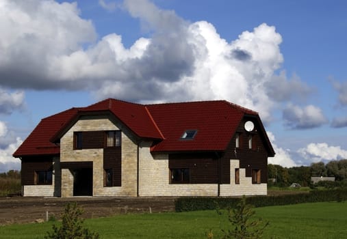 Modern apartment house on a background of the blue sky