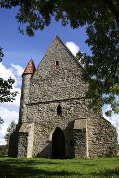 Old chapel with a tower of 18 centuries