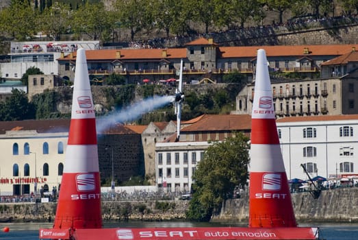 PORTO, PORTUGAL - AUGUST 31: Mike Mangold from USA participates in the event Red Bull Air Race AUGUST 31, 2007 in Porto, PORTUGAL.