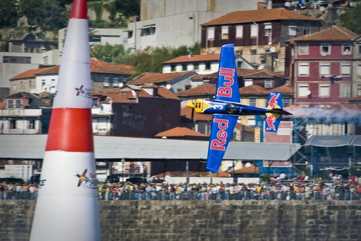 PORTO - SEPTEMBER 7: Paul Bonhomme from UK participates in the event Red Bull Air Race in September 1, 2008 in Porto, Portugal.