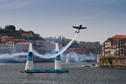 PORTO - SEPTEMBER 7: Mike Mangold from USA participates in the event Red Bull Air Race in September 1, 2008 in Porto, Portugal.