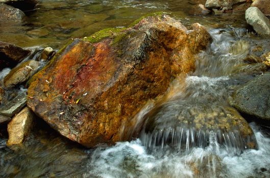 Kuznetsk Alatau - a mountainous country in Siberia is rich in rivers, streams and waterfalls.