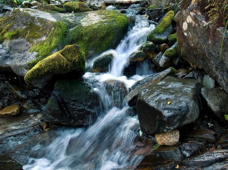 Kuznetsk Alatau - a mountainous country in Siberia is rich in rivers, streams and waterfalls.