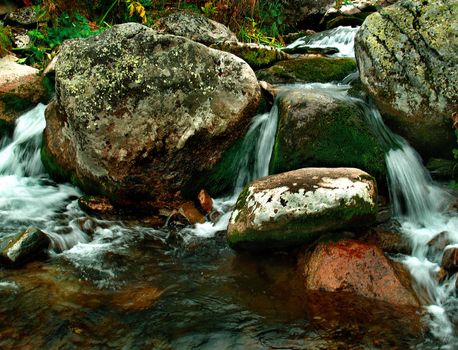 Kuznetsk Alatau - a mountainous country in Siberia is rich in rivers, streams and waterfalls.