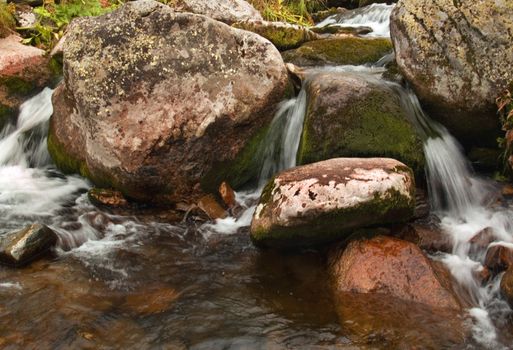 Kuznetsk Alatau - a mountainous country in Siberia is rich in rivers, streams and waterfalls.