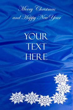 Merry Christmas blue card with snowflakes