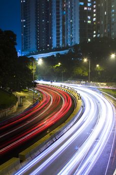traffic in city at night in hong kong.