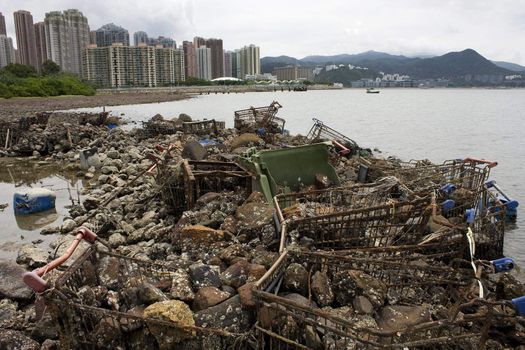 Garbage piled up on the coast of the ocean