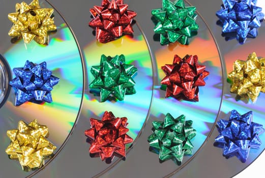 Disks with multicolored bows lay abreast