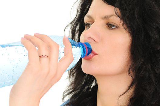 The woman with a bottle of water isolated on white background