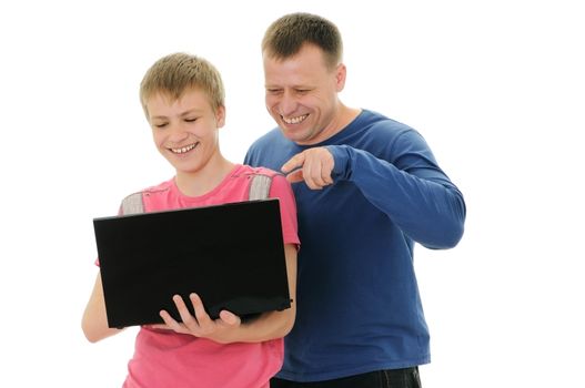 The father and the son look in laptop isolated on white background