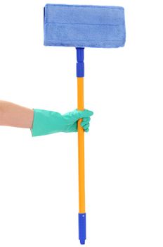 The hand holds a mop isolated on a white background