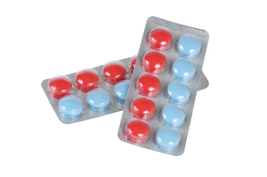blue and red tablets isolated on white background