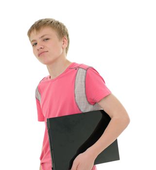 The teenager with laptop isolated on white background