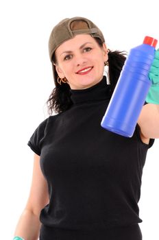 The woman in a cap and green gloves examines a washing-up liquid