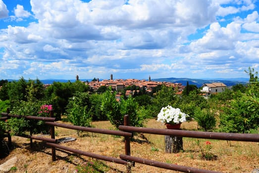 Typical Medieval Tuscan City Surrounded By Blossoming Gardens