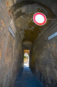 Narrow corridor leading to the ancient synagogue in Siena