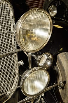 The old automobile headlight taken as close up