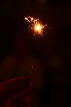 a sparkler starting to burn