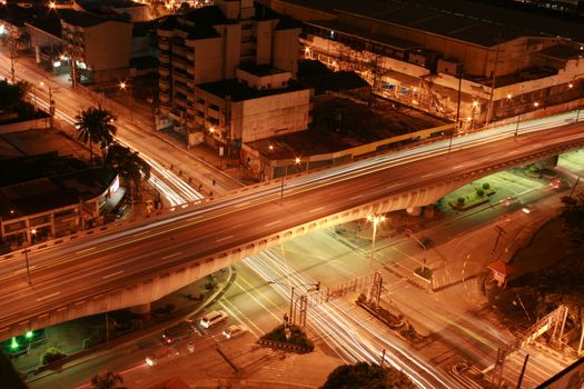 intersection at night with light and motion blur