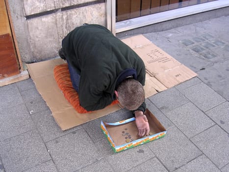 poor man on tje street          