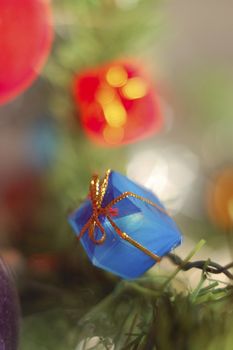 blue gift on a Christmas decoration