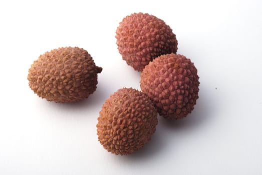 litchis on a white background