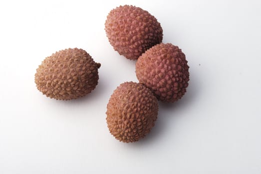 litchis on a white background