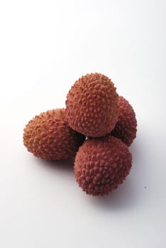 litchis on a white background