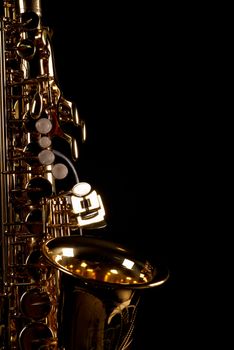 Lateral take of a golden alto saxophone