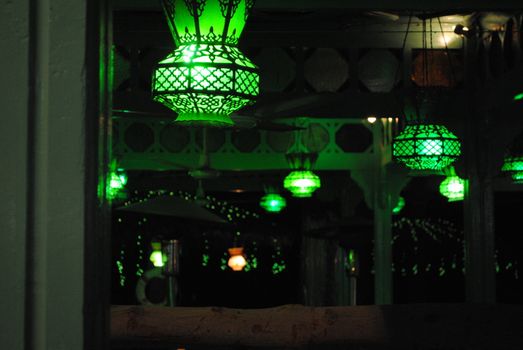 Green lighting in an outdoor café at the harbor of Sharm el-Sheikh.