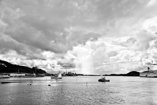 dramatic cloudscape in the harbor of Oslo Norway