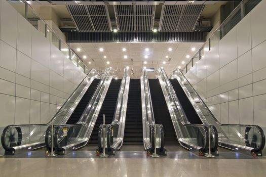 Escalators in Underground Tunnel of Train Station