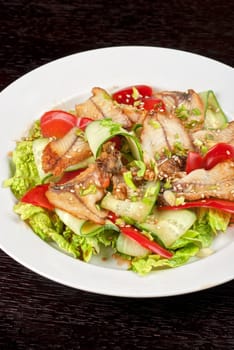 Salad of smoked eel, lettuce,Chinese cabbage and vegetables