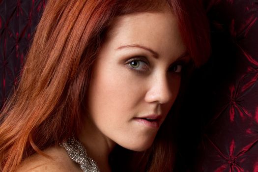 Beautiful young redhead woman closeup