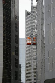 Red elevator on construction site