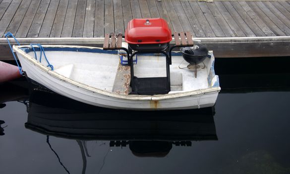 Little boat alone at the dock