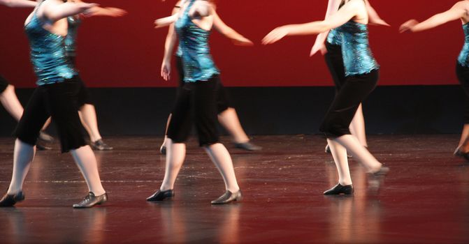 Young dancers performing on stage