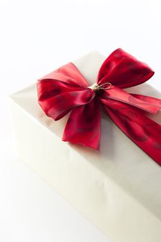 Close up of red bow on Christmas gift.
