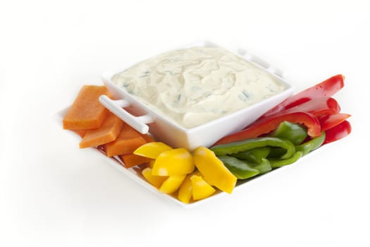 Raw peppers and carrots with fresh creamy dip.