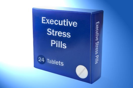 Close up on a blue medication box with the words 'Executive stress pills' arranged over blue light filter.